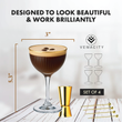 Load image into Gallery viewer, Nick and Nora glass with gold rim filled with espresso martini, shown with gold jigger and cocktail picks, with product dimensions 5.3 x 3 inches.