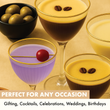 Load image into Gallery viewer, Assorted cocktails in Nick and Nora glasses with gold rims, styled with olives and cherries, showing perfect serve for gifting and celebrations.