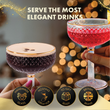 Load image into Gallery viewer, Two coupe glasses with espresso martini and red cocktail served elegantly with holiday lights background