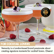 Load image into Gallery viewer, Pair of Vemacity coupe cocktail glasses with pink cocktails garnished with edible flowers, styled with raspberries and copper shaker.