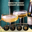 Load image into Gallery viewer, Two champagne cocktails served in Vemacity coupe glasses, elegant design ideal for hosting, gifting, and celebrations.
