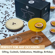 Load image into Gallery viewer, Set of 2 Vemacity crystal coupe glasses with espresso martini and passionfruit cocktail, gift box in background, perfect for celebrations.