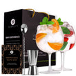 Load image into Gallery viewer, A set of handcrafted crystal gin glasses with silver bar accessories including a bar spoon, shot measure, and a recipe e-book, presented in a black gift box with gold accents.