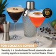 Load image into Gallery viewer, Two ribbed martini cocktails with silver glass shaker, bar spoon and jigger; British brand badge and coffee beans styling.
