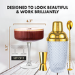 Load image into Gallery viewer, Ribbed coupe glass with gold cocktail shaker and bar tools showing 5.3 inch height and 4.3 inch width.