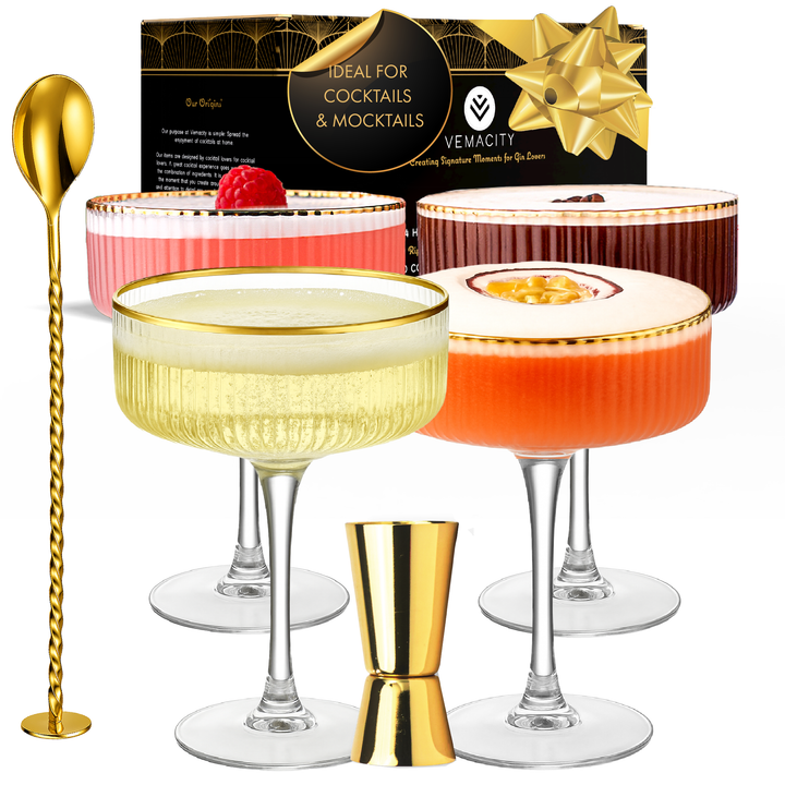 Elegant coupe cocktail glass with gold rim, cocktail and gin gift set