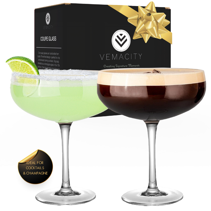 Set of 2 Vemacity coupe cocktail glasses with margarita and espresso martini, shown in gift-ready packaging with gold bow.