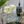 Load image into Gallery viewer, Luxury Vemacity gin glasses with gold rim, filled with cucumber gin and tonic on stylish home bar cart
