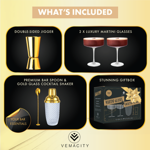 Cocktail gift set includes gold cocktail shaker, 2 ribbed coupe glasses, bar spoon, double jigger, and gift box.