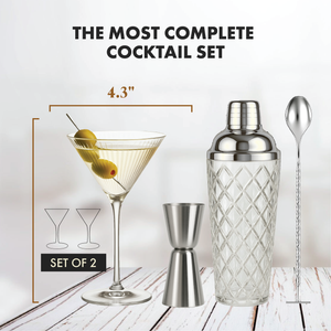 Ribbed martini glass with olives, 4.3 inch wide bowl; set includes 2 glasses, silver glass shaker, bar spoon, and jigger.