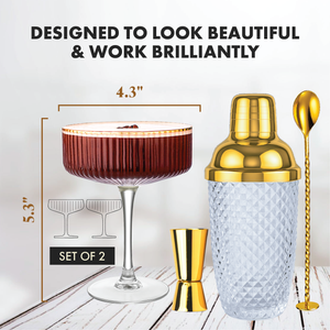 Ribbed coupe glass with gold cocktail shaker and bar tools showing 5.3 inch height and 4.3 inch width.