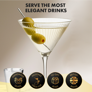 Close-up of Vemacity ribbed martini glass with olive garnish, elegant handmade design, perfect for gifting and hosting.