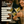 Load image into Gallery viewer, Couple enjoying cocktails in Vemacity ribbed martini glasses, highlighted features include unique design, bar tools, and giftable packaging.
