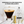 Load image into Gallery viewer, Vemacity stemless martini glass with gold rim shown with product dimensions 4.1 x 4.1 inches and set of four design, including gold bar accessories.
