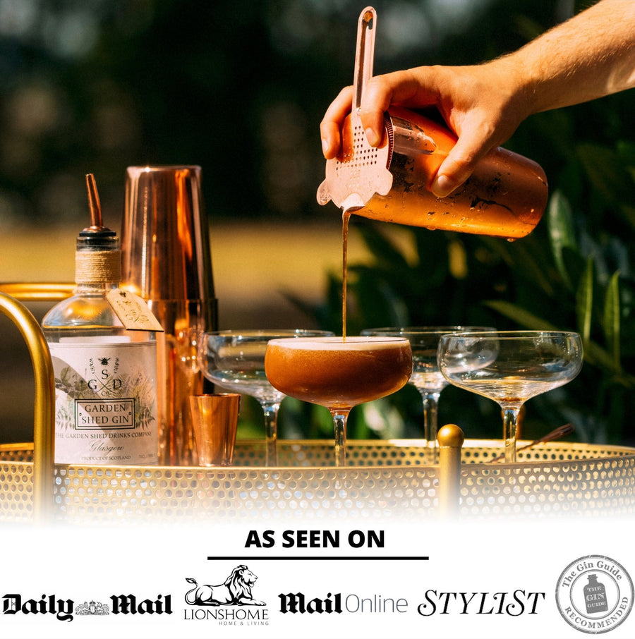 https://vemacity.com/cdn/shop/products/elegant-cocktail-shaker-set-with-2-x-handmade-martini-glasses-412338_900x.jpg?v=1701180246