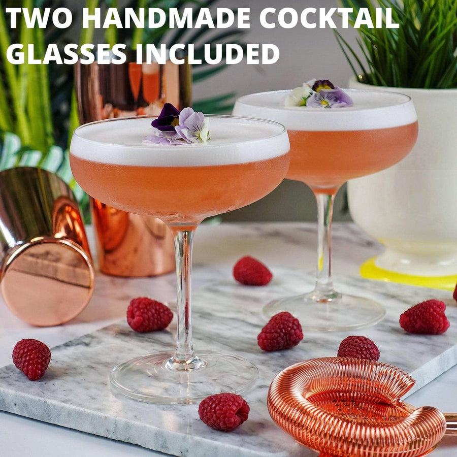 https://vemacity.com/cdn/shop/products/elegant-cocktail-shaker-set-with-2-x-handmade-martini-glasses-435878_900x.jpg?v=1701180246